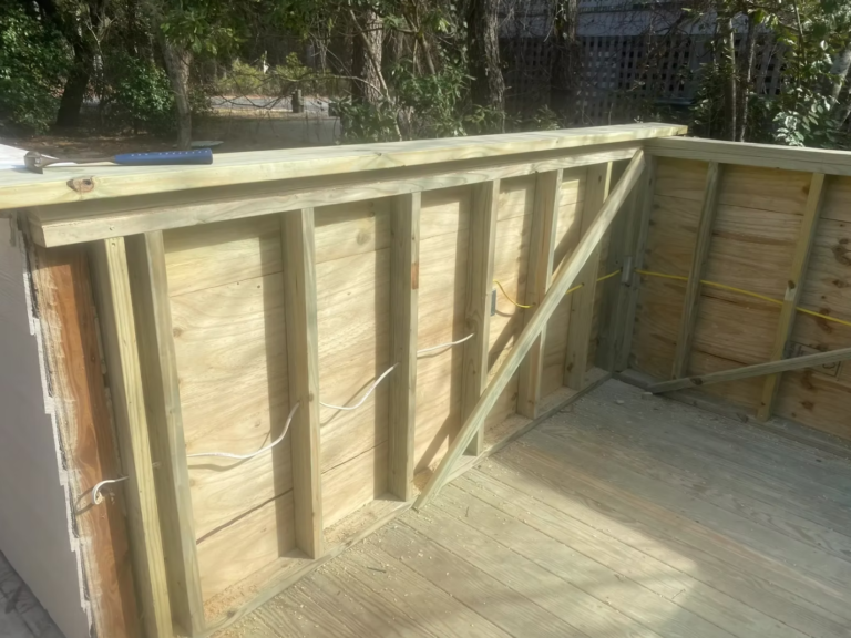 Existing deck enlarged and reframed for a spa by Cas and Cal Construction
