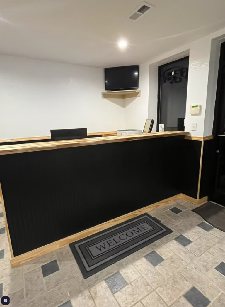 Finished front counter at an auto service center built out by Cas and Cal Construction