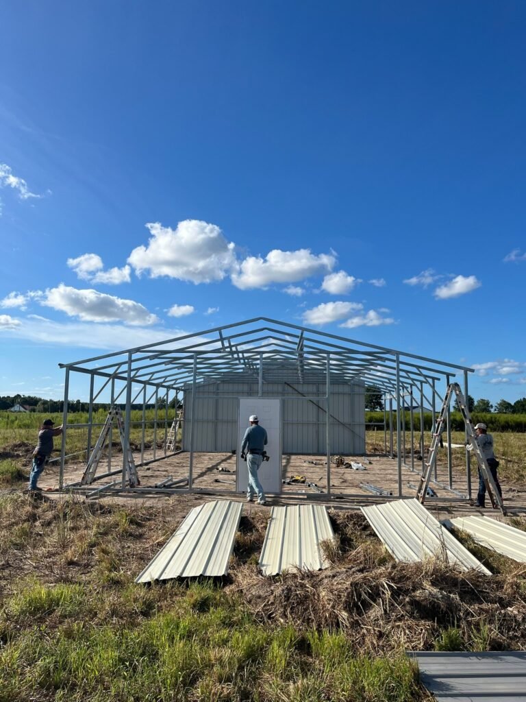 Cas and Cal crew framing a metal horse barn on a farm in northeastern North Carolina