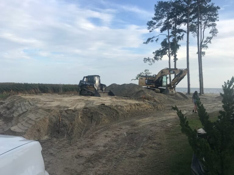 Site work on a waterfront lot for a custom home by Cas and Cal Construction